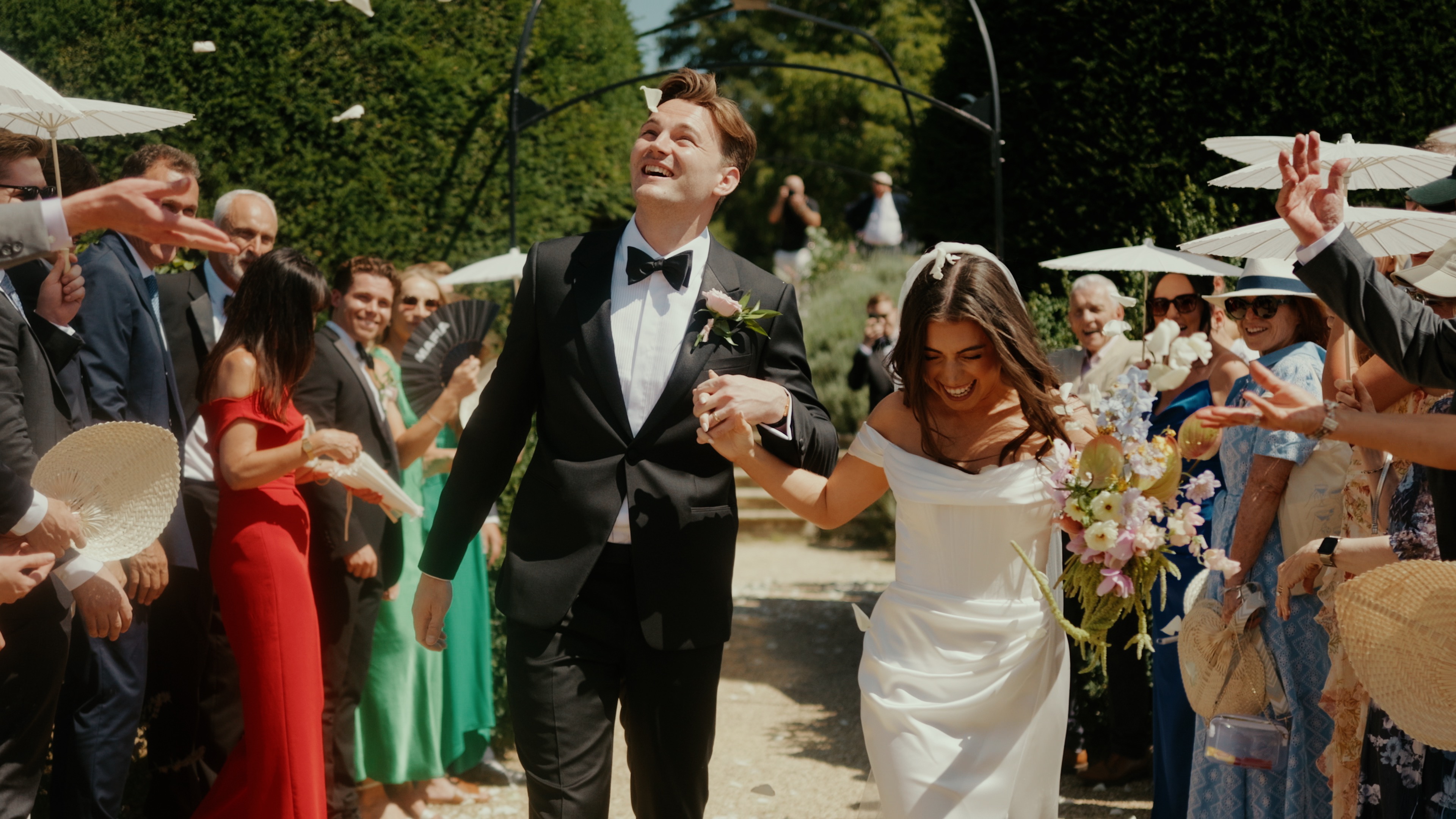 Fairytale wedding ceremony exit at Sudeley Castle Cotswolds filmed by Alistair Kings