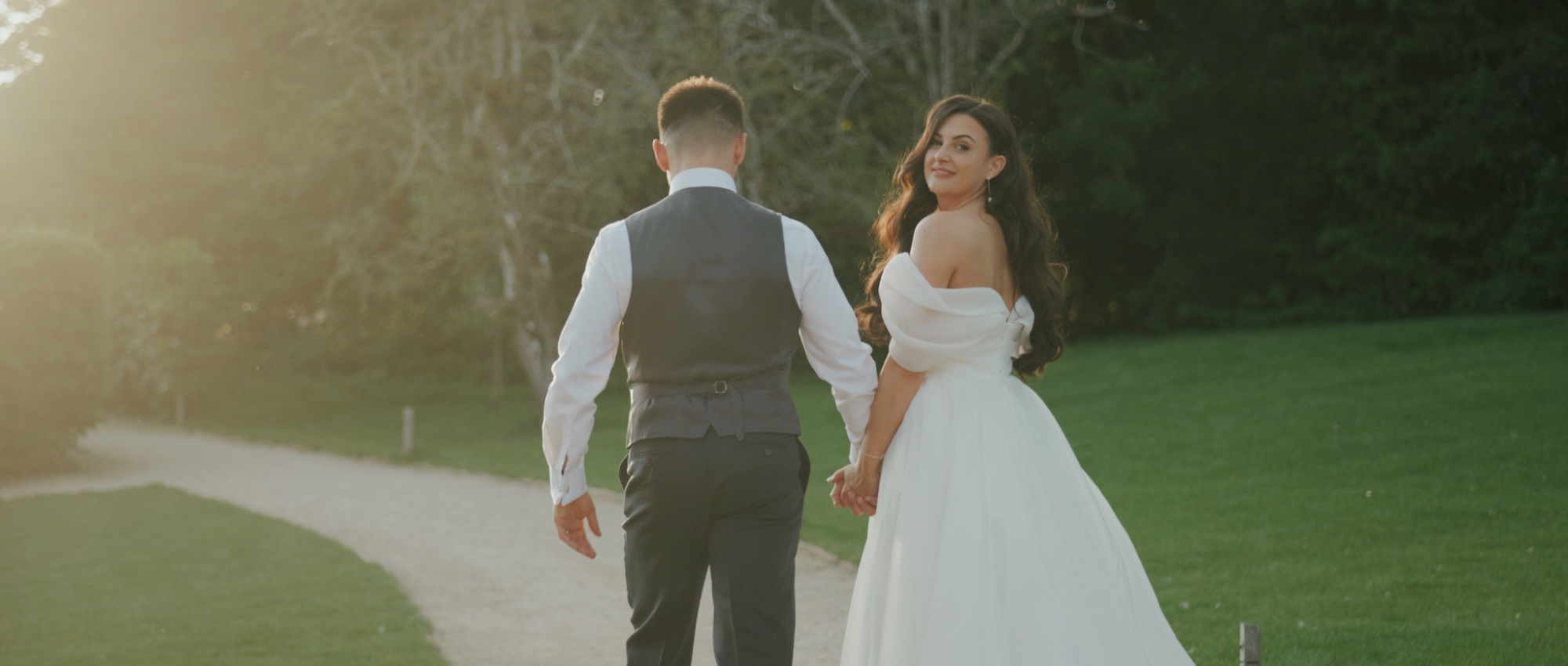 Sarah and Sam golden hour portrait at Old Gore Barn Cotswolds wedding film by Alistair Kings